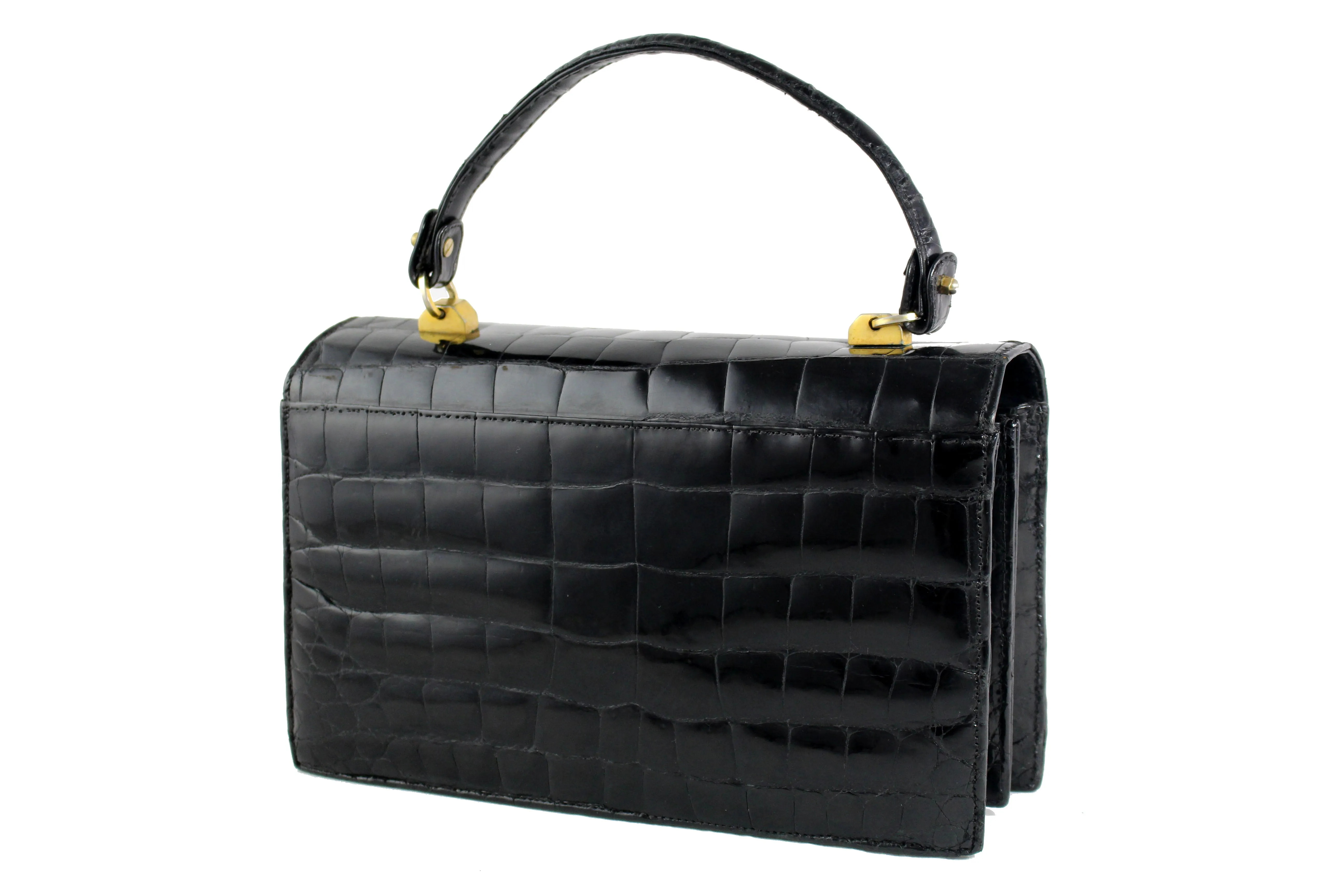 Jet black crocodile skin handbag with flap and double clasp