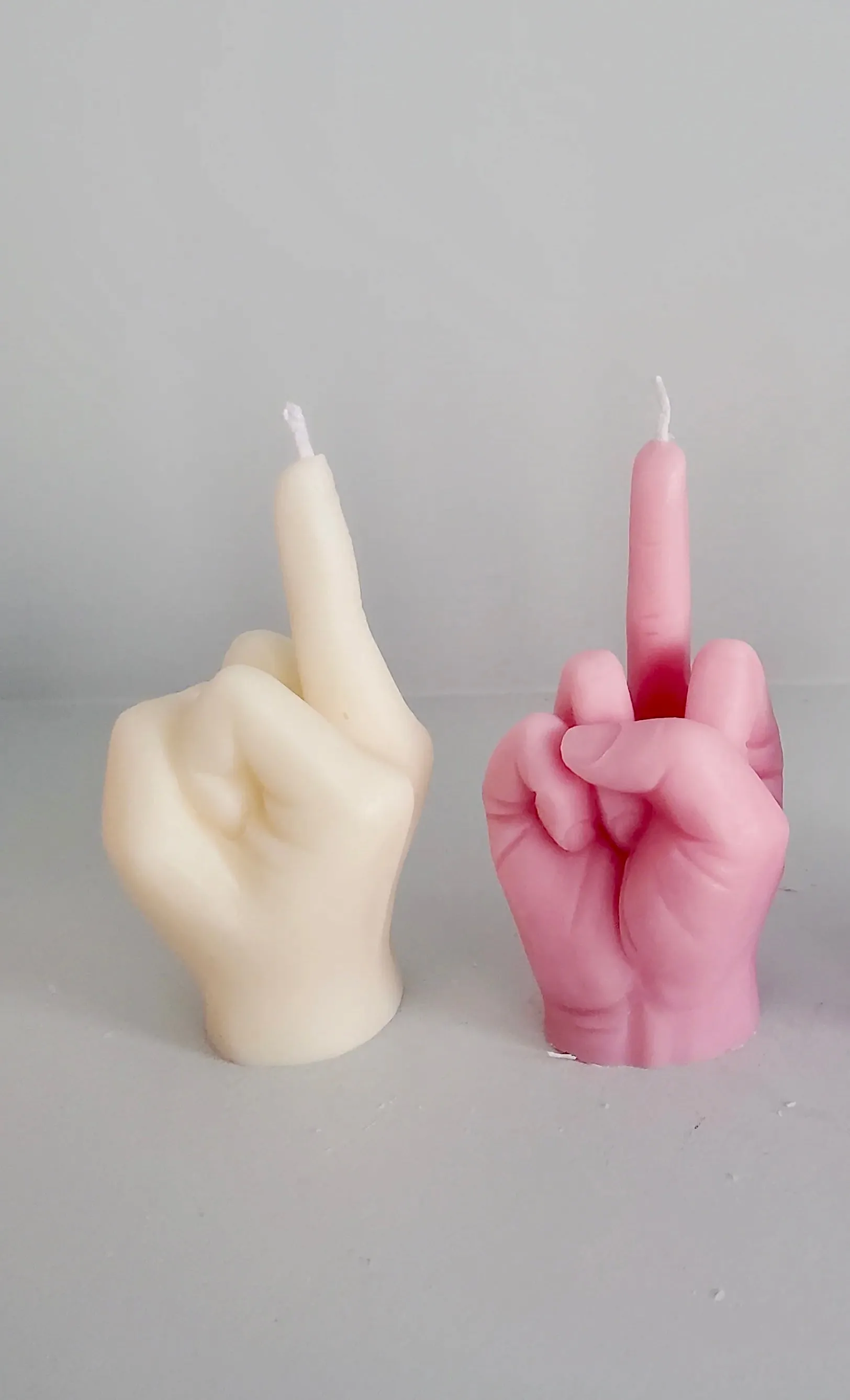 Middle Finger Candle  FLIP OFF sign wax art, protest, defiance, expression, humor, statement, controversy, bold, irreverent, dissent, unconventional art