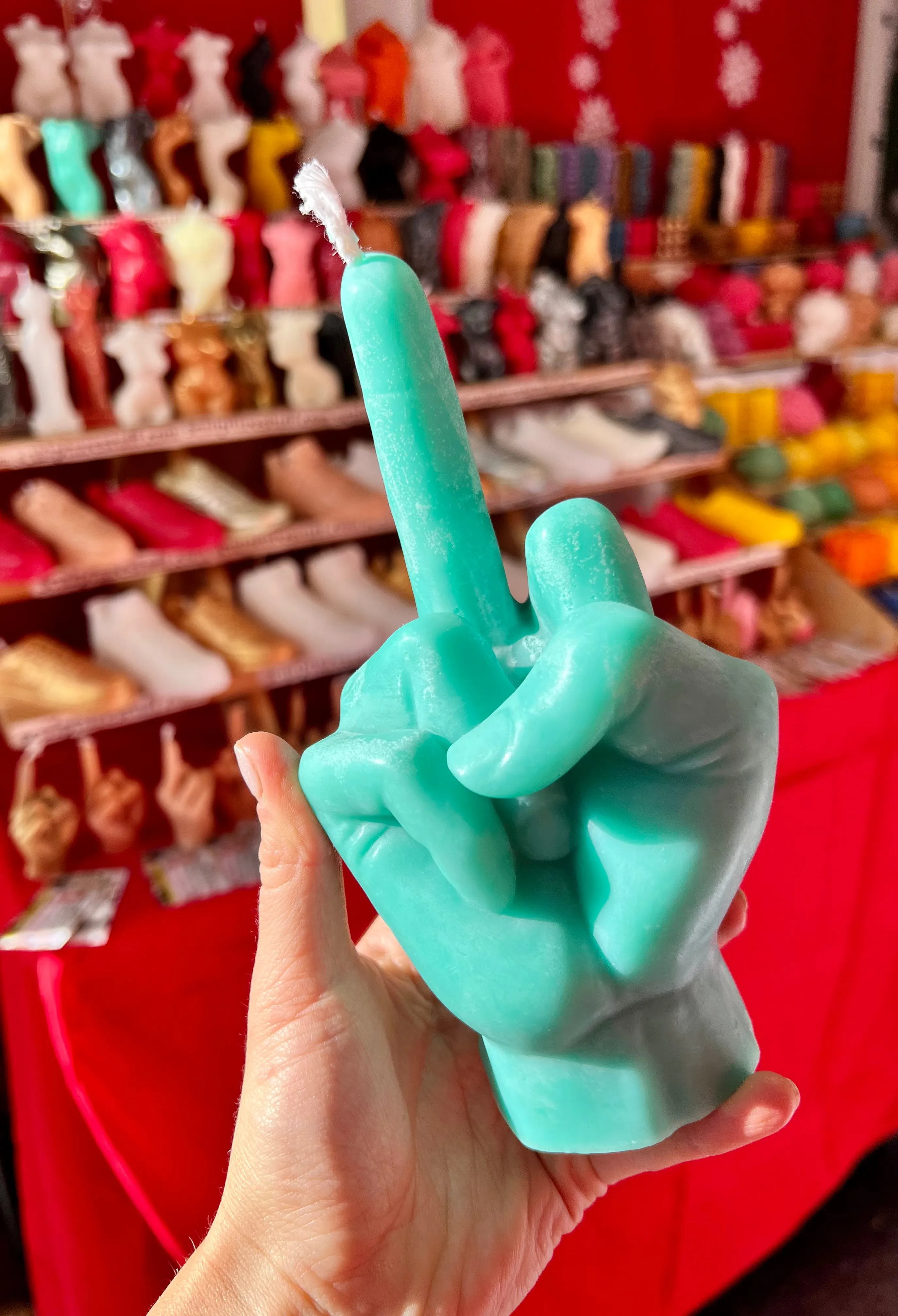 Middle Finger Candle  FLIP OFF sign wax art, protest, defiance, expression, humor, statement, controversy, bold, irreverent, dissent, unconventional art