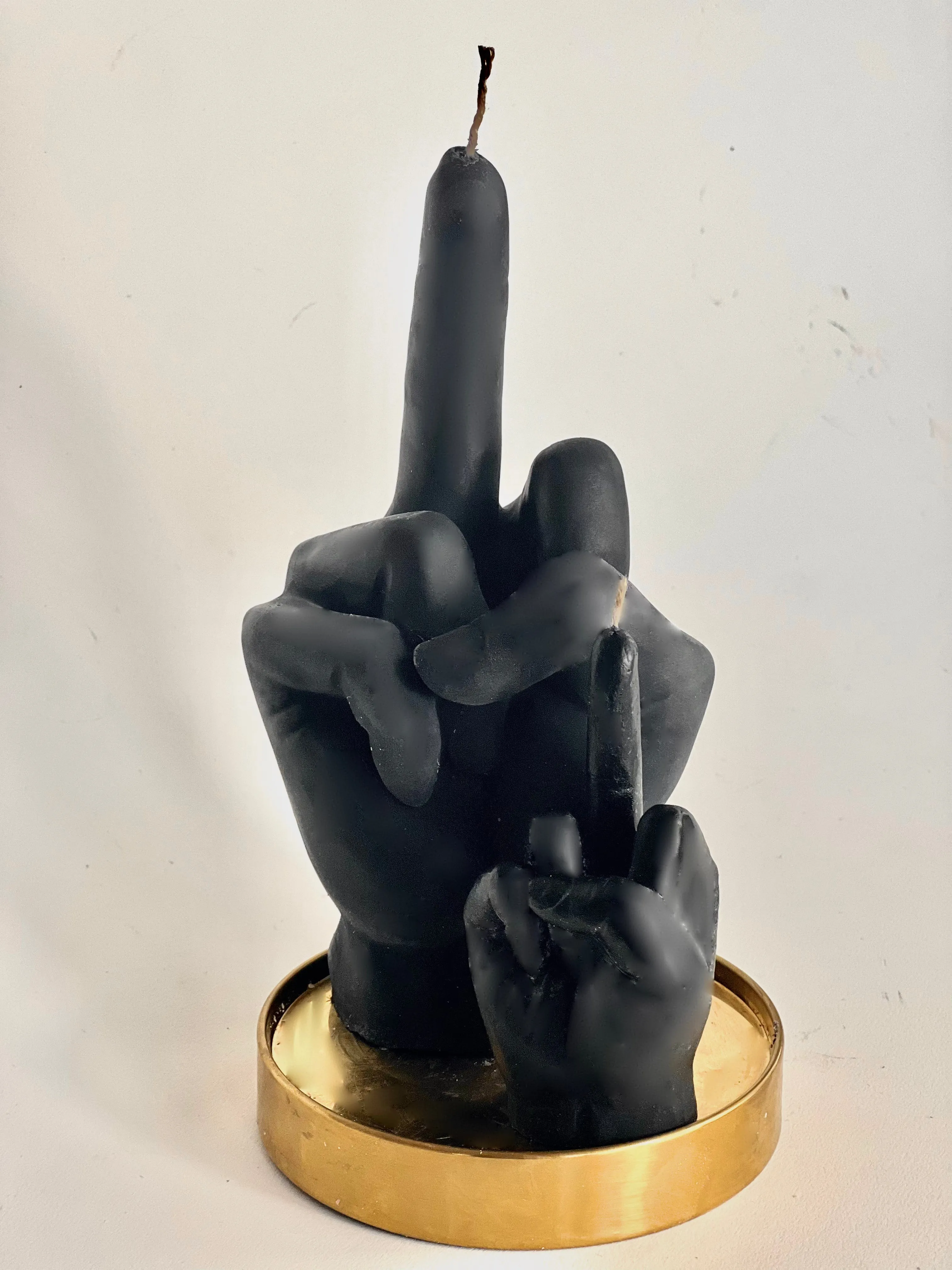 Middle Finger Candle  FLIP OFF sign wax art, protest, defiance, expression, humor, statement, controversy, bold, irreverent, dissent, unconventional art