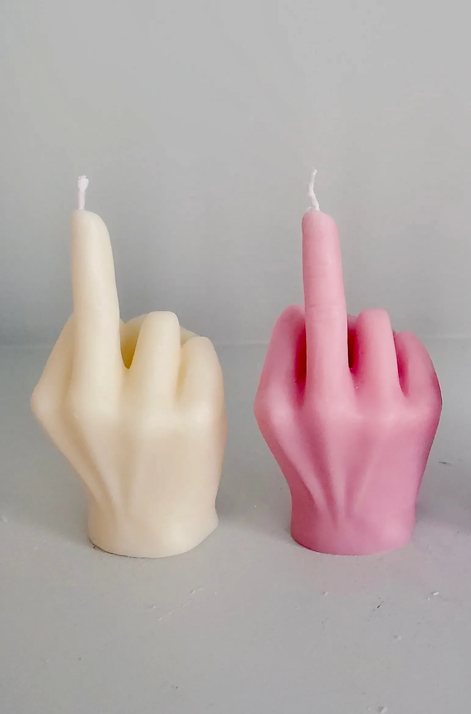 Middle Finger Candle  FLIP OFF sign wax art, protest, defiance, expression, humor, statement, controversy, bold, irreverent, dissent, unconventional art